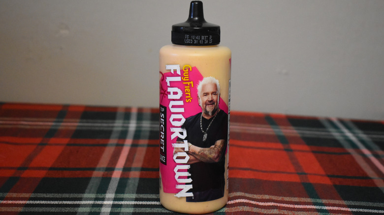 bottle of yellow sauce with guy fieri on front