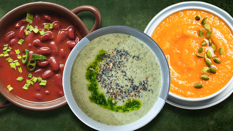 Three types of  vegetarian vegetable soups on green background