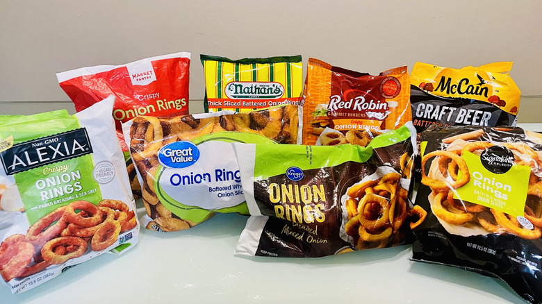 Bags of various brands of frozen onion rings