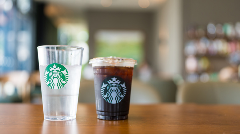 Starbucks cups on table
