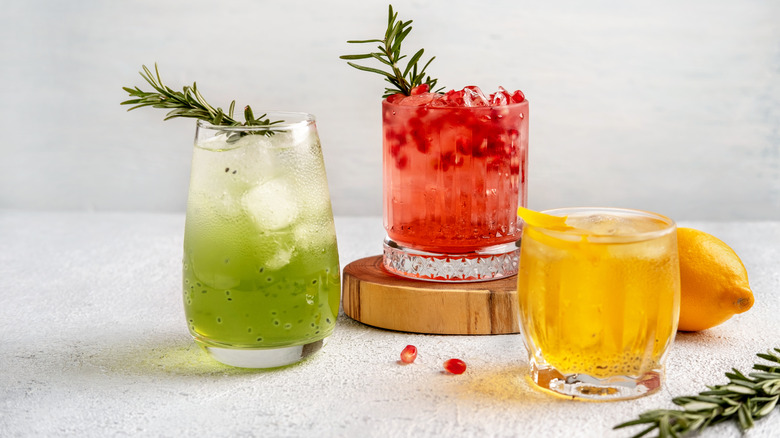 Three cocktails on a counter