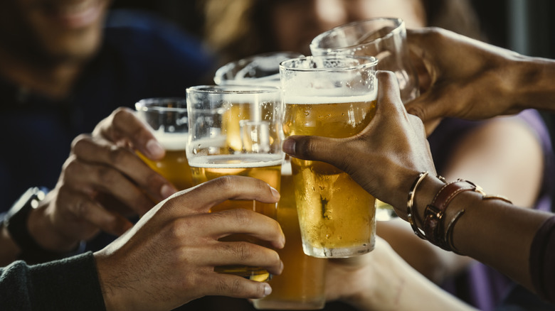 Group of friends making a beer toast