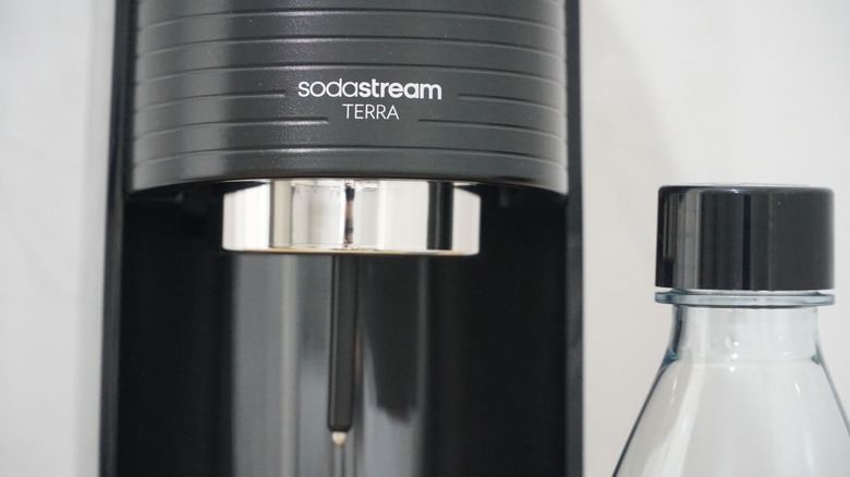 A SodaStream device with a plastic bottle
