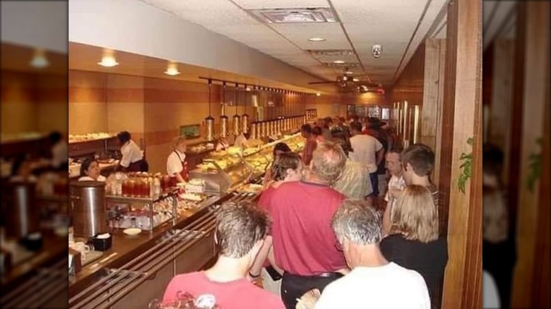 An image of the former Morrison's Cafe on a crowded day with people standing in line