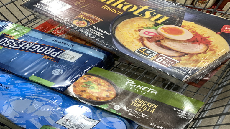 A carton of Nongshim Tonkotsu Ramen in a cart at a Costco warehouse