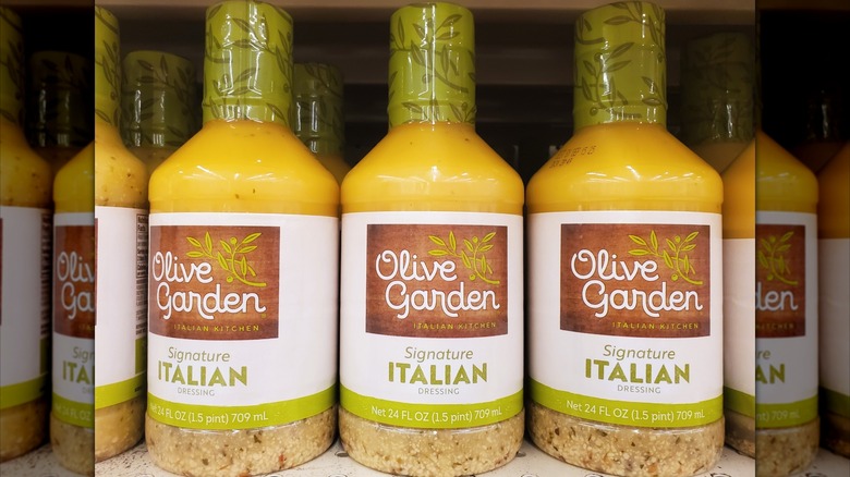 Bottles of Olive Garden Signature Italian Dressing in a grocery store