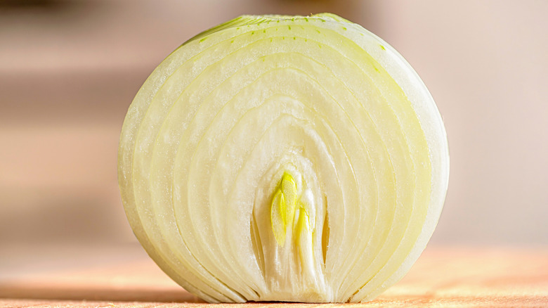 A close up image of half an onion