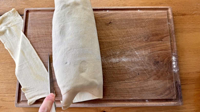 trimming off excess pastry