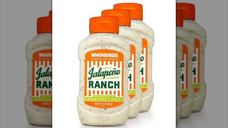 Three bottles of Whataburger Spicy Jalapeño Ranch Sauce